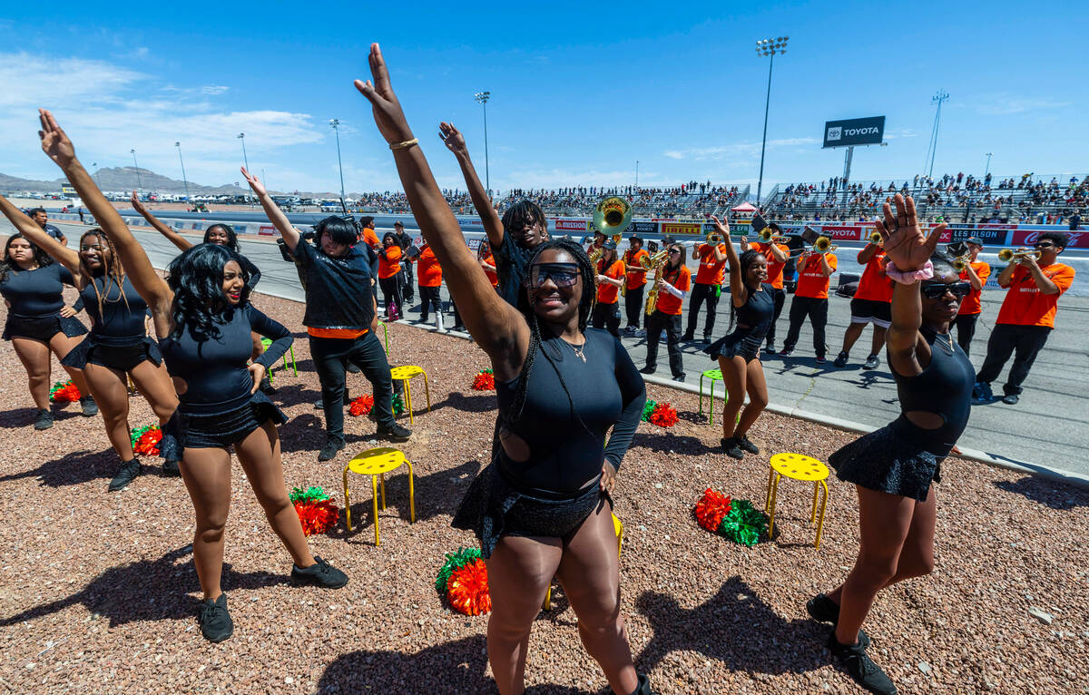 Mojave High School dancers and band members perform for the crowd during Day 1 of NHRA 4-Wide N ...
