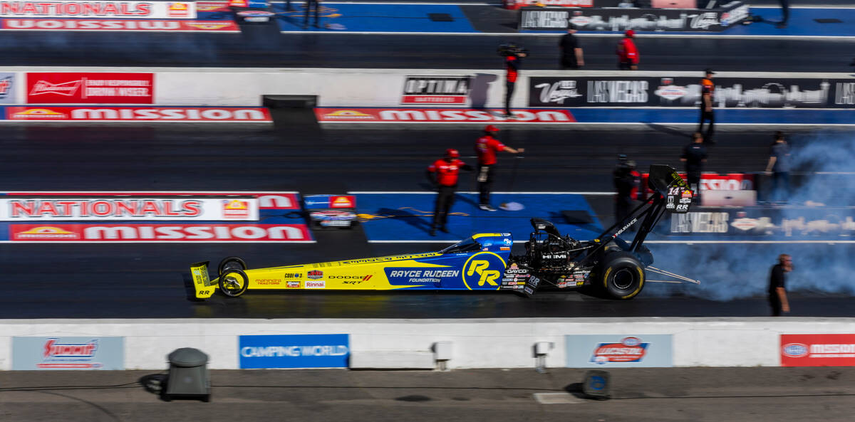 Top Fuel driver Tony Stewart warms his tires during Day 1 of NHRA 4-Wide Nationals on "The ...