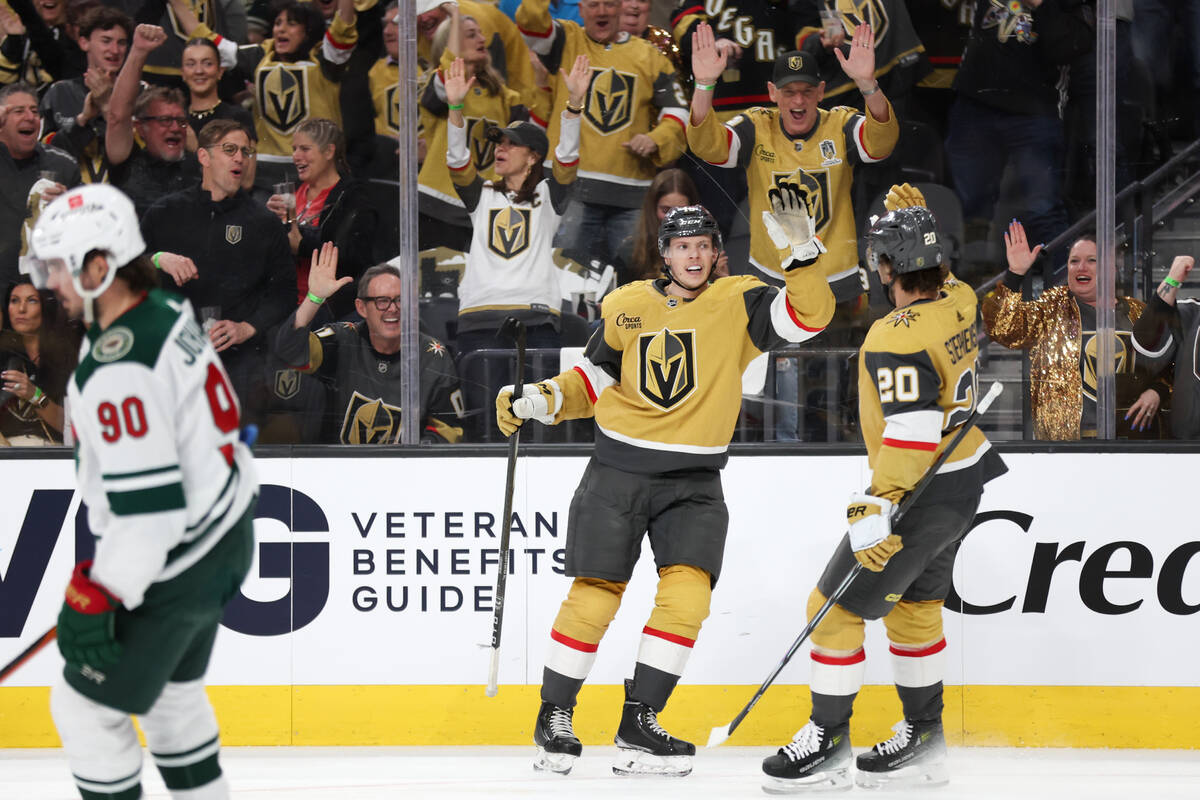 Golden Knights left wing Pavel Dorofeyev (16) and center Chandler Stephenson (20) celebrate the ...