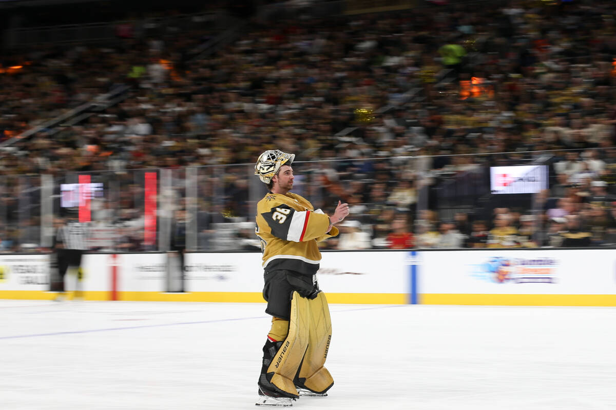 Golden Knights goaltender Logan Thompson (36) skates to the net for the second period of an NHL ...