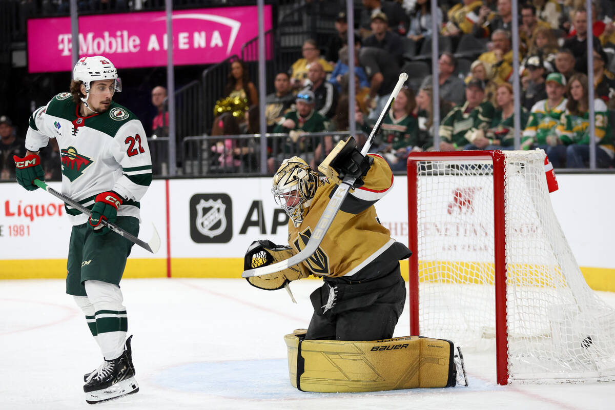 Wild center Marat Khusnutdinov (22) scores a goal on Golden Knights goaltender Logan Thompson ( ...