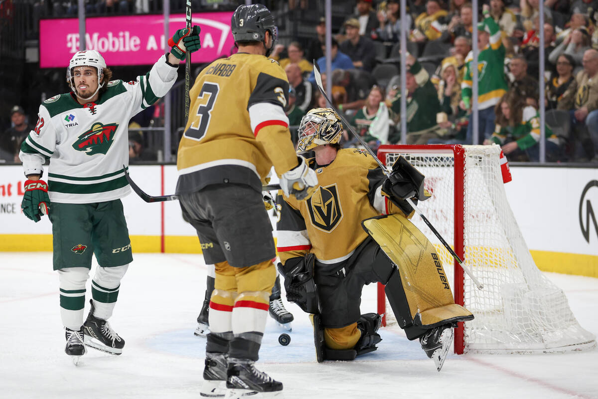 Wild center Marat Khusnutdinov (22) celebrates after scoring a goal on Golden Knights goaltende ...