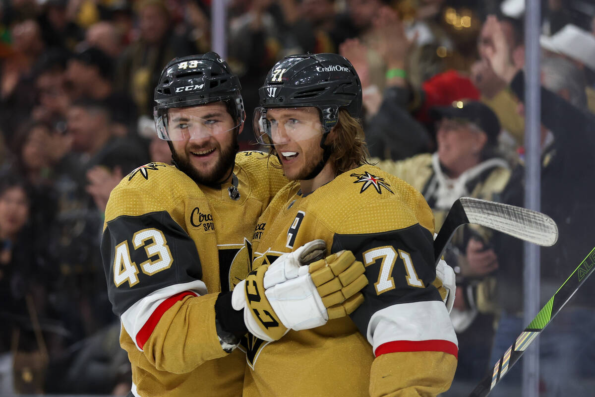 Golden Knights center Paul Cotter (43) and center William Karlsson (71) celebrate their goal du ...