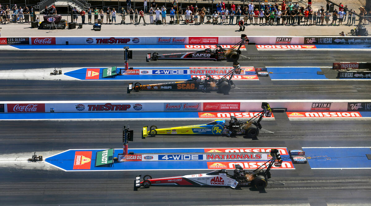 Top Fuel drivers Doug Kalitta, Tony Stewart, Justin Ashley and Billy Torrence blast from the st ...
