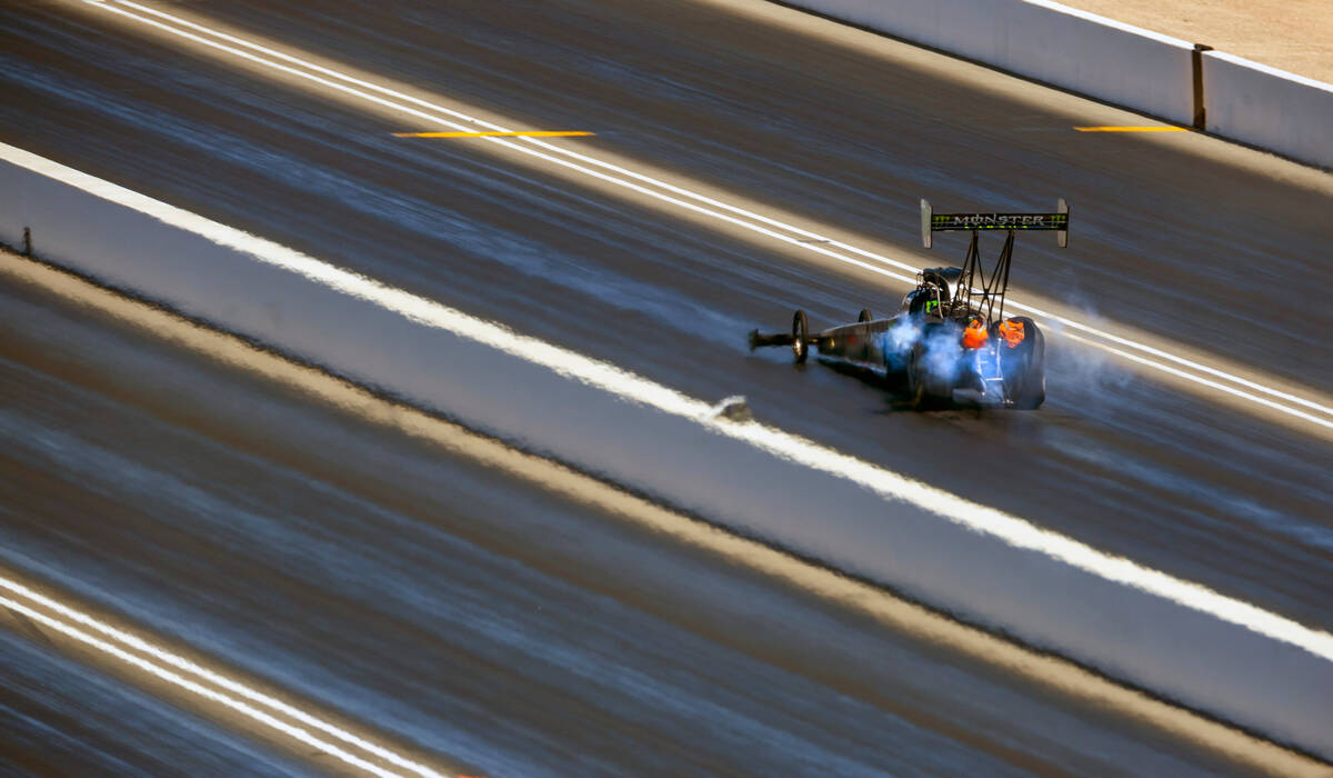 Top Fuel driver Brittany Force races down the track during Day 2 of NHRA 4-Wide Nationals on &q ...