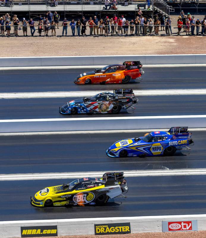 (From bottom) Funny Car drivers Bob Tasca III, Ron Capps, Matt Hagan and Gary Densham race down ...