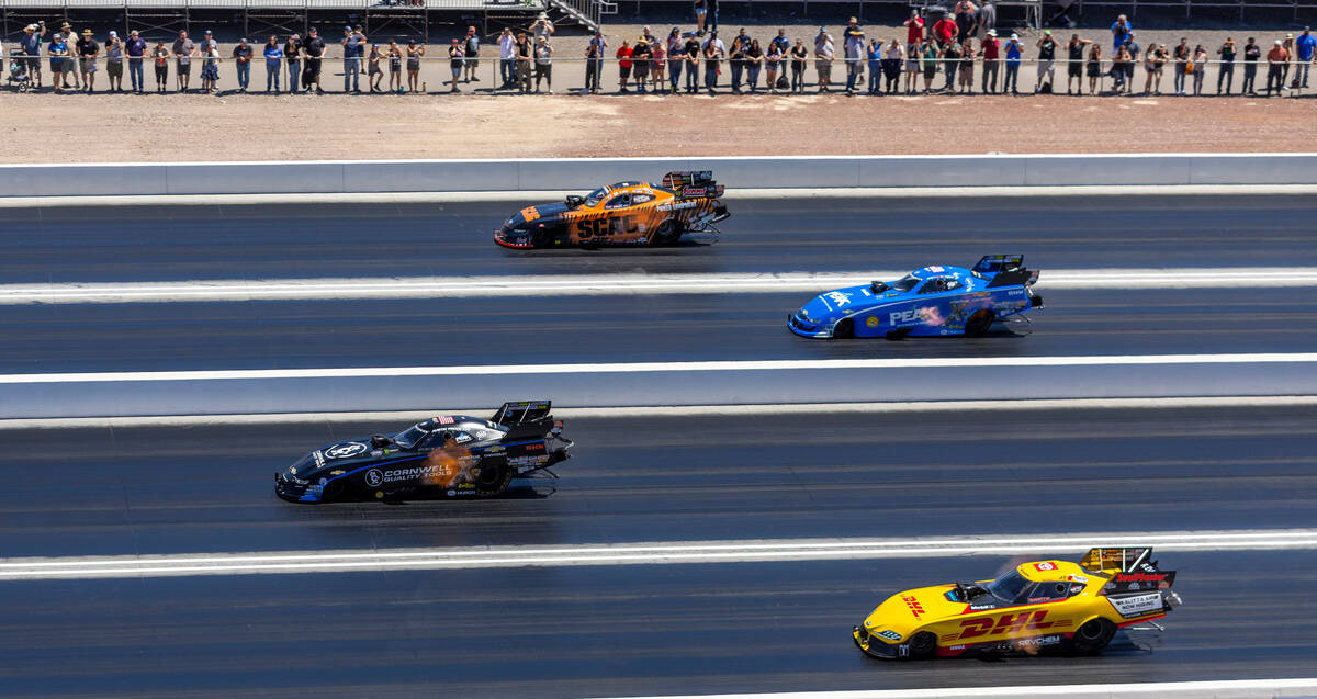 (From bottom) Funny Car drivers J.R. Todd, Austin Prock, John Force and Daniel Wilkerson race d ...