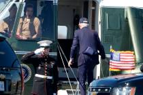 President Joe Biden boards Marine One at Gordons Pond in Rehoboth Beach, Del., Saturday, April ...