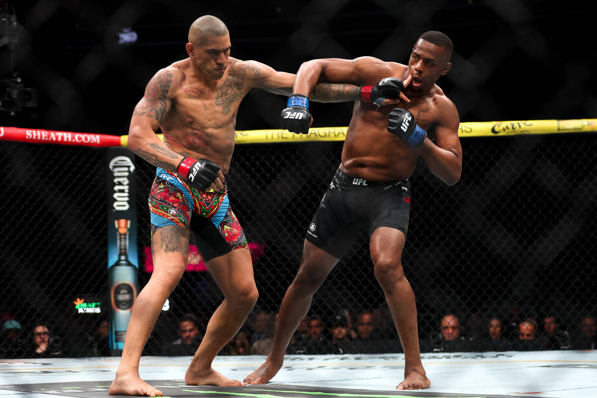 Alex Pereira fights Jamahal Hill during a UFC 300 mixed martial arts light heavyweight bout at ...