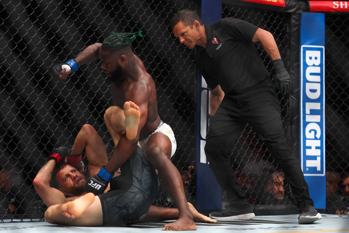 Aljamain Sterling punches Calvin Kattar during a UFC 300 mixed martial arts featherweight bout ...