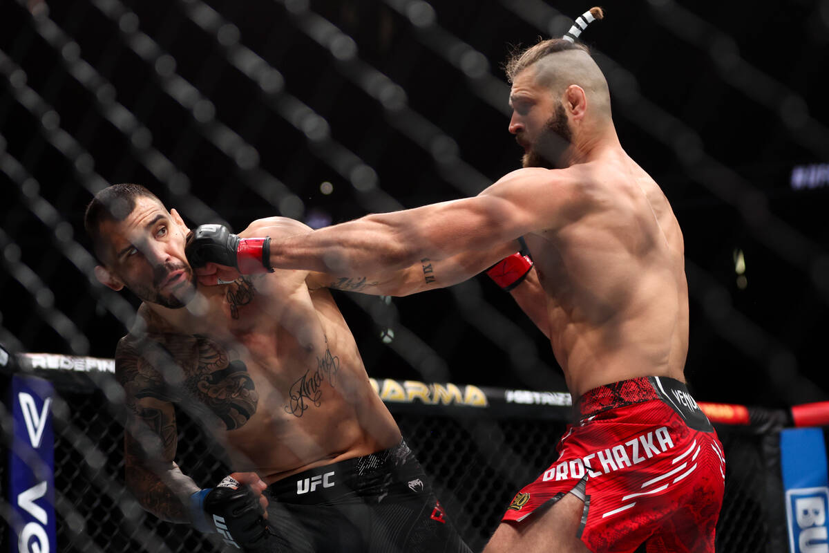 Jiri Prochazka gets a left on Aleksandar Rakic during a UFC 300 mixed martial arts light heavyw ...
