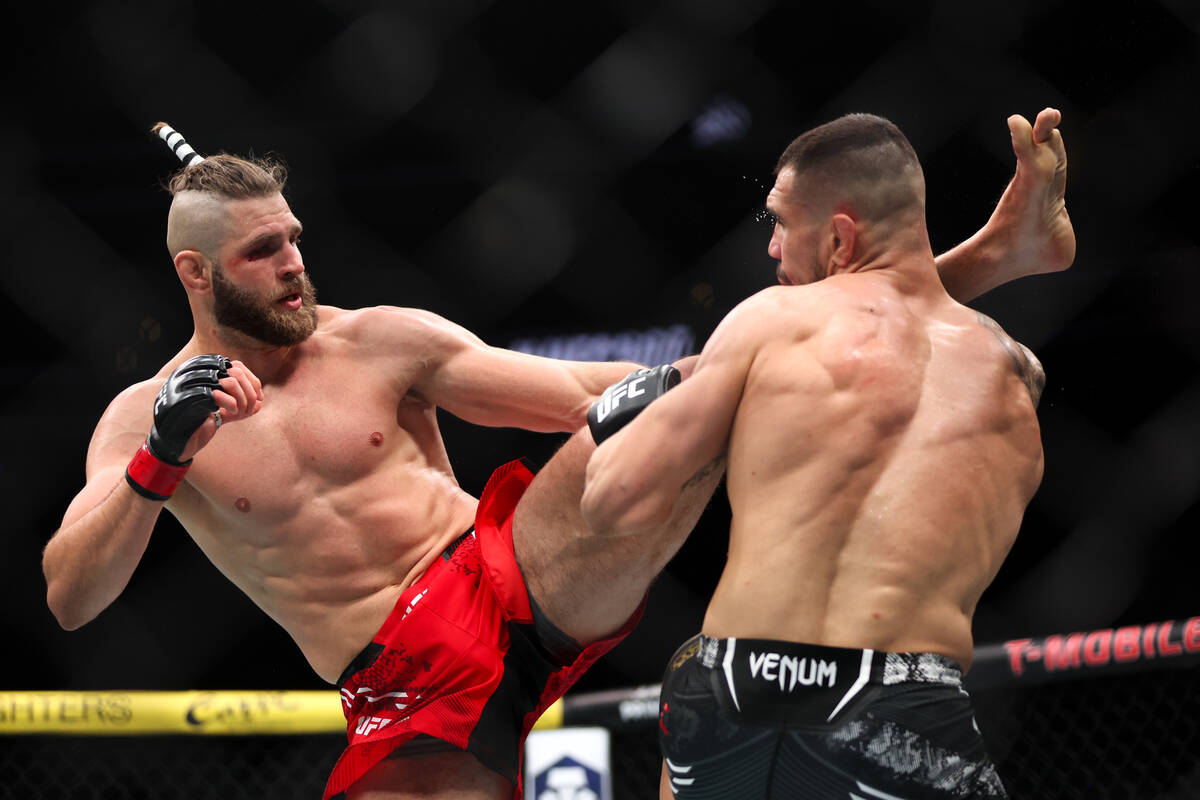 Jiri Prochazka high-kicks Aleksandar Rakic during a UFC 300 mixed martial arts light heavyweigh ...