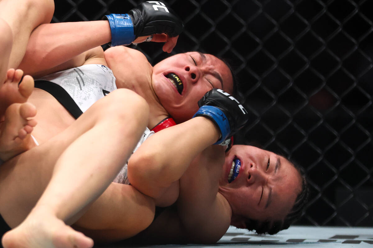 Weili Zhang has Xiaonan Yan in a chokehold during a UFC 300 mixed martial arts women’s s ...