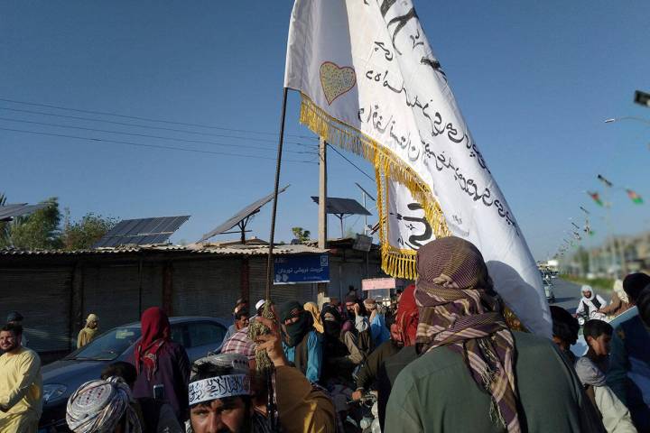 Taliban fighters are seen inside the city of Farah, capital of Farah province southwest of Kabu ...