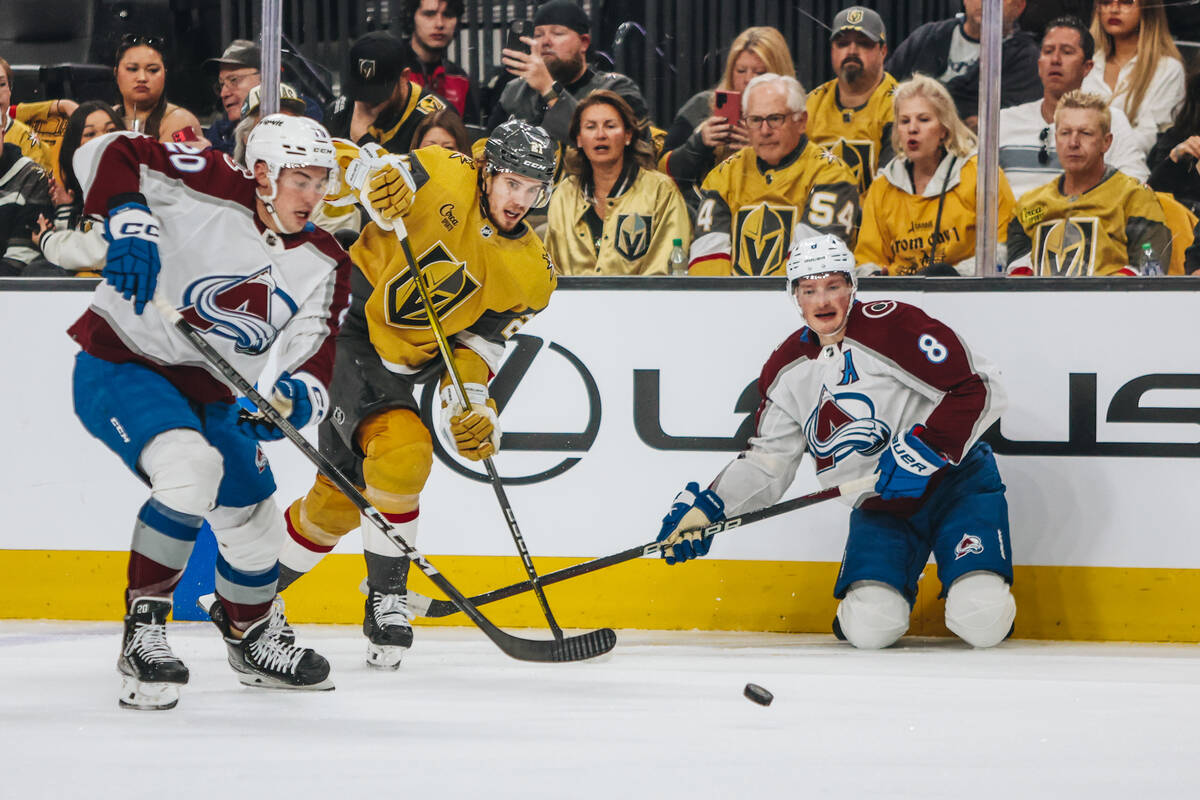 Golden Knights center Brett Howden (21) races to the puck during an NHL hockey game between the ...