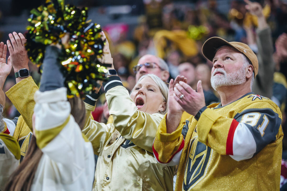 Fans cheer for a Golden knights goal that ended up being called back by the referees during an ...