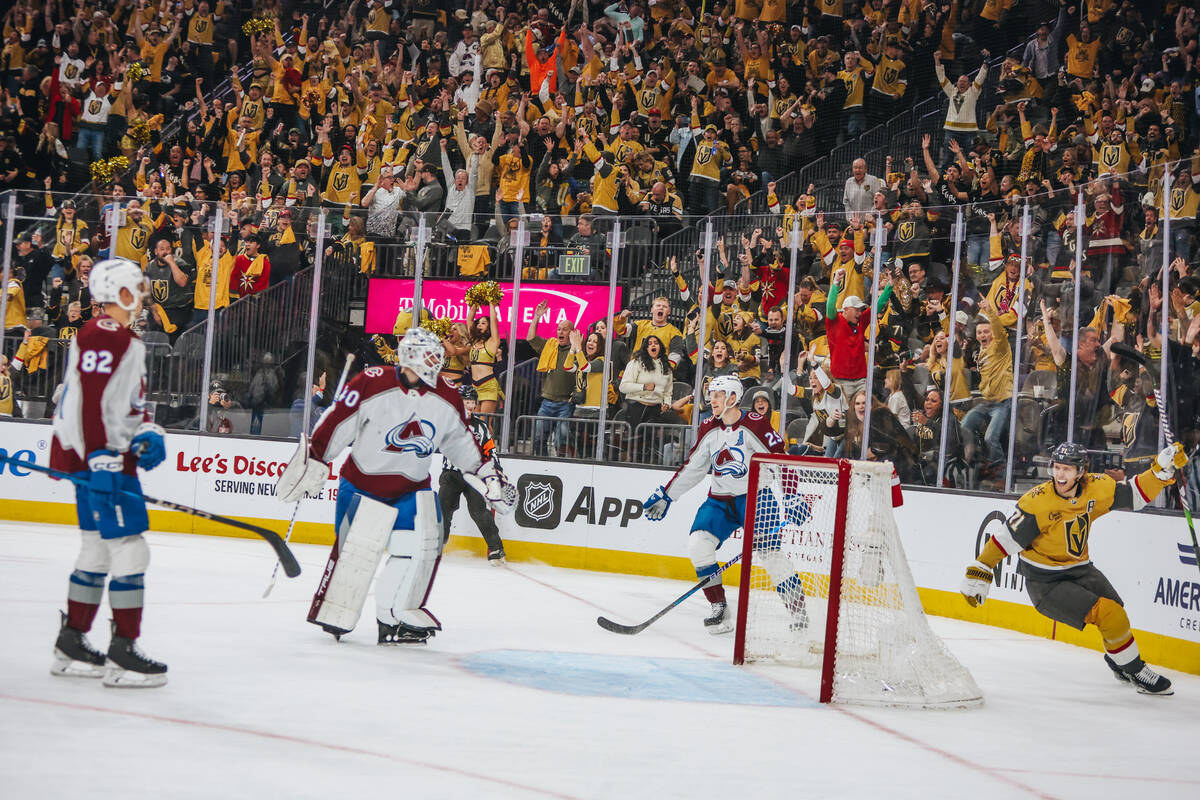 Golden Knights center William Karlsson (71) celebrates a goal along with Golden Knights fans du ...