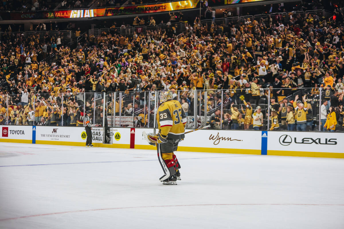 Golden Knights goaltender Adin Hill (33) skates off the ice after the Golden Knights win in ove ...