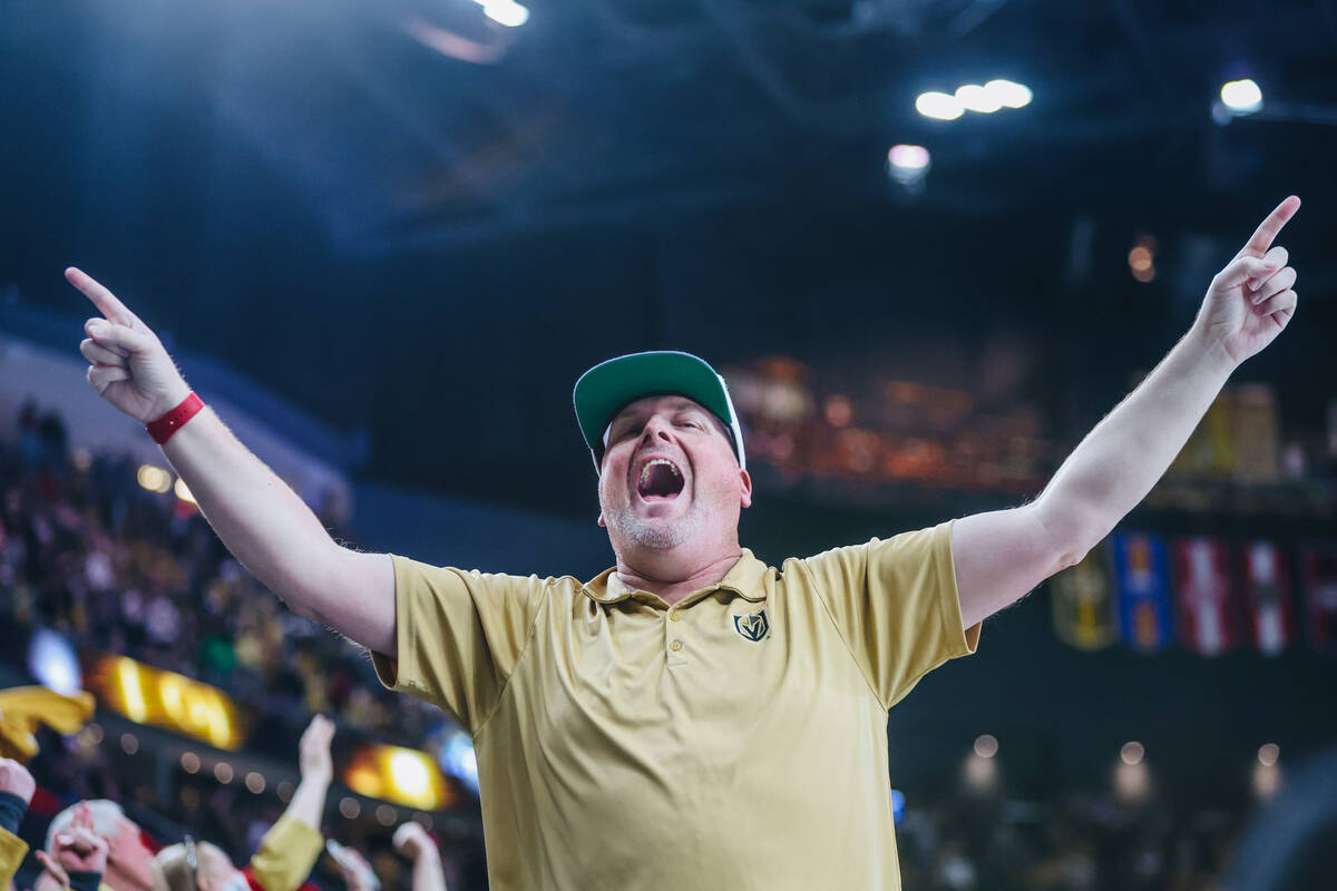 Golden Knights fans celebrate an overtime win during an NHL hockey game between the Golden Knig ...