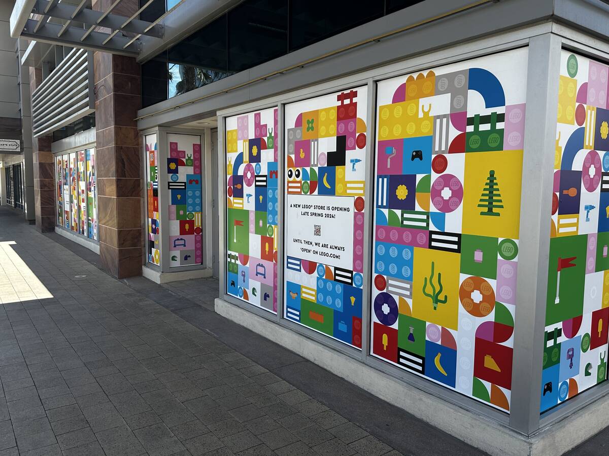 A sign shown Friday, April 12, 2024, indicates that a new Lego store is set to come to Downtown ...