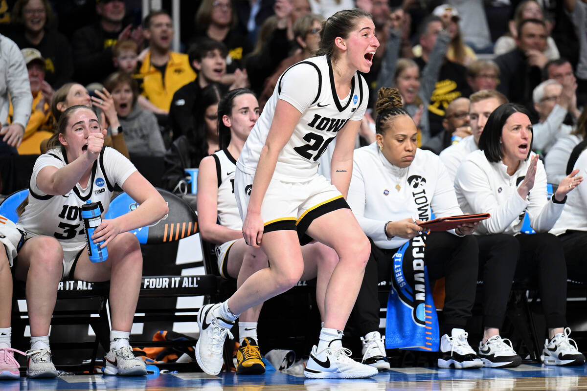 Iowa guard Kate Martin (20) reacts during the fourth quarter of a Sweet Sixteen round college b ...