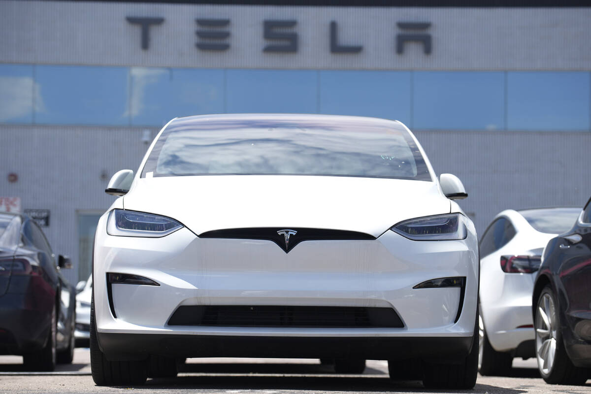 An 2023 Model X sits outside a Tesla dealership on June 18, 2023, in Englewood, Colo. After rep ...