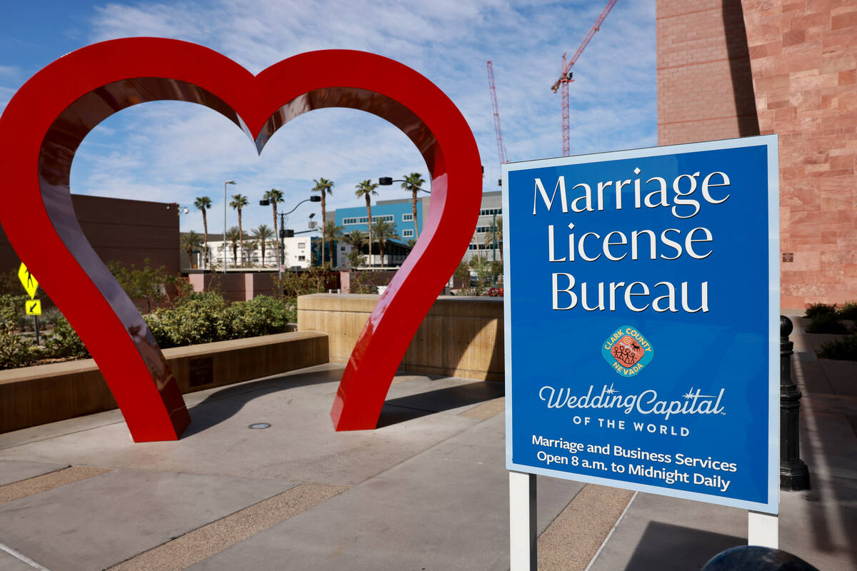 A sign touting Las Vegas at the “wedding capital of the world” is shown at the Ma ...