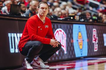 UNLV head coach Kevin Kruger stares down a referee during a second-round NIT game between Bosto ...