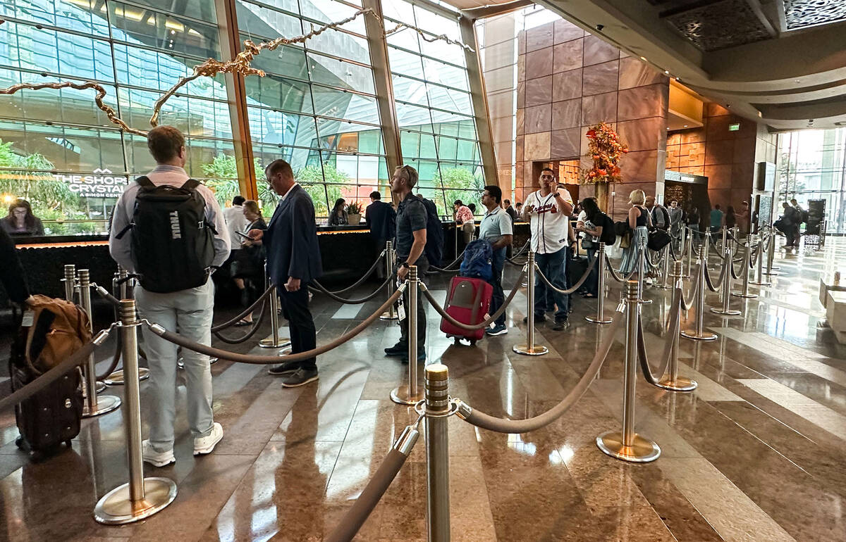 Long lines at the check-in for Aria Resort and Casino on Monday, Sept. 11, 2023, in Las Vegas. ...