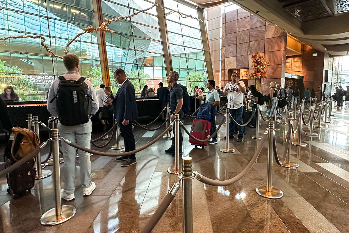 Long lines at the check-in for Aria Resort and Casino on Monday, Sept. 11, 2023, in Las Vegas. ...