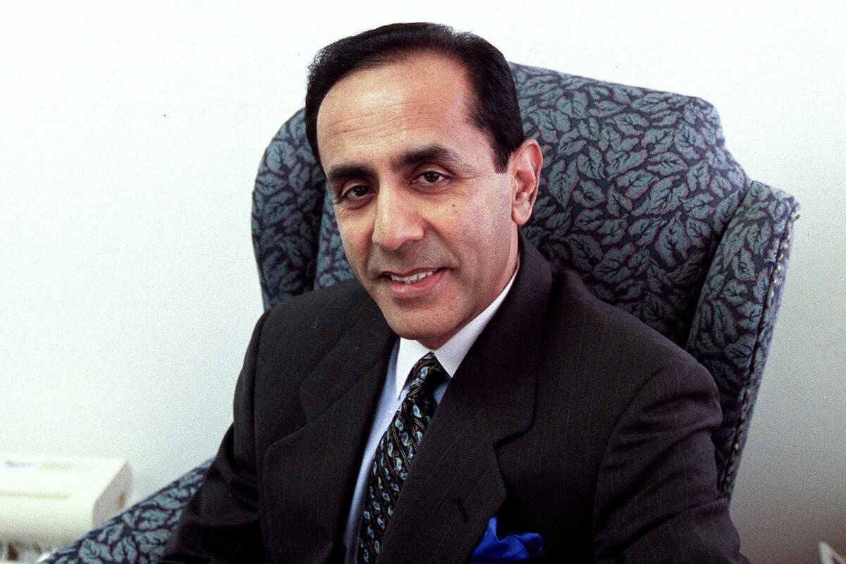 Dr. Ikram U. Khan sits for a photo in his Las Vegas office Wednesday, July 24, 2002. (Christine ...