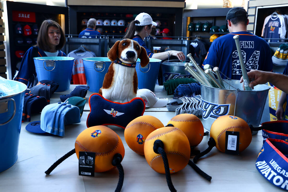 Dog toys and Finn the Bat Dog merchandise is for sale on the night of the Las Vegas Aviators&#x ...