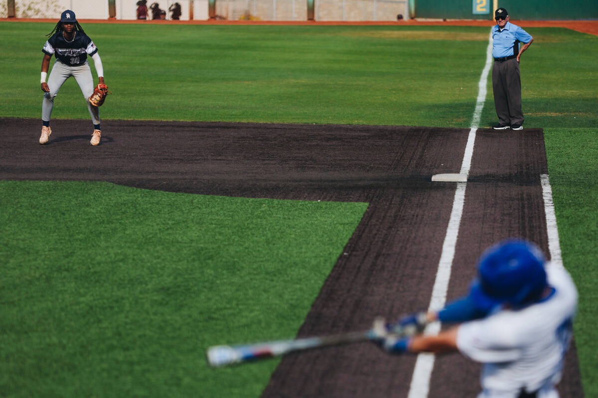 Shadow Ridge third baseman Christian Wilkes (30) gets ready to hustle during an baseball game b ...