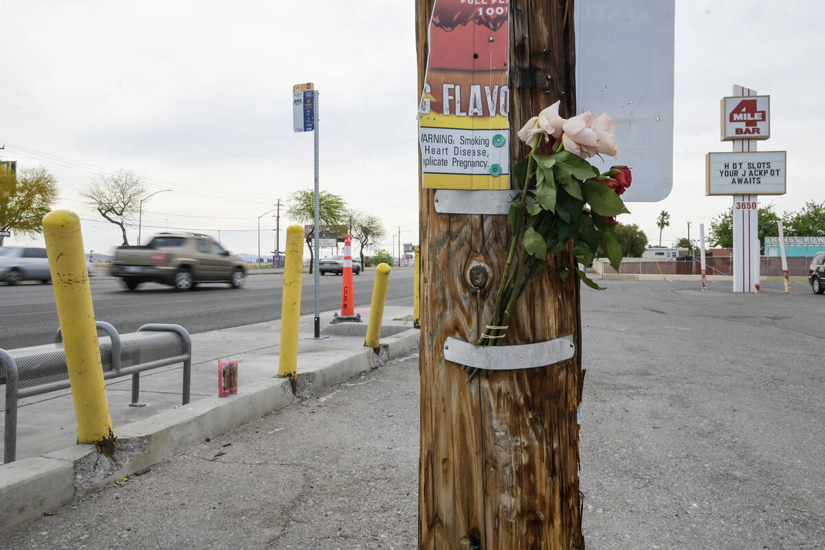 Flowers and candles mark the scene on Boulder Highway near Sahara Avenue Thursday, April 18, 20 ...