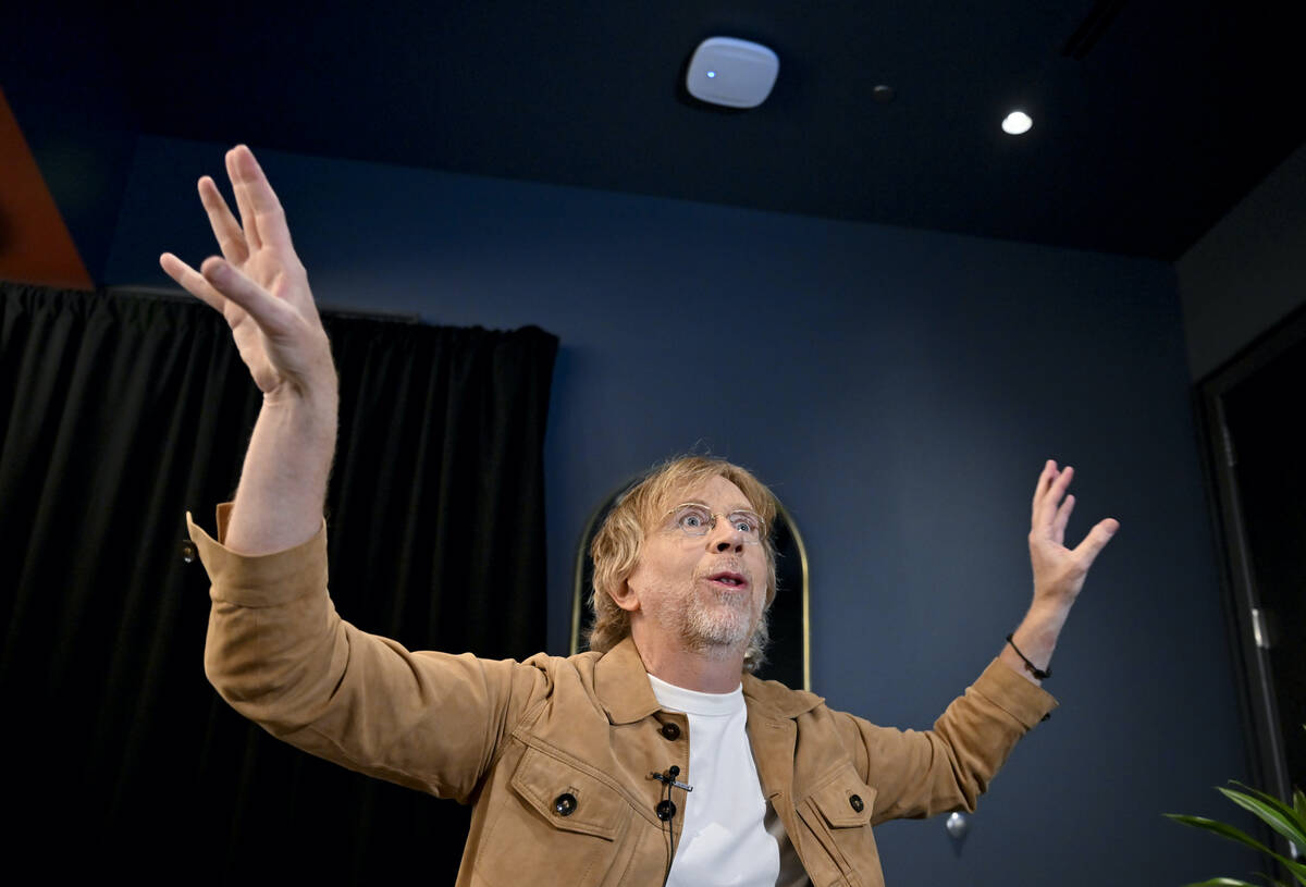 Trey Anastasio, guitarist and singer-songwriter of the band Phish, gestures during an interview ...