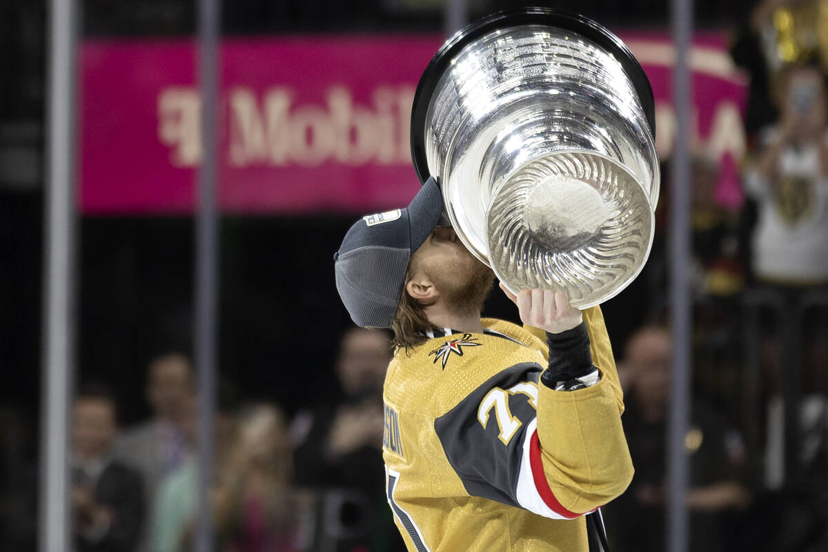 Golden Knights center William Karlsson (71) kisses the Stanley Cup after winning the NHL hockey ...