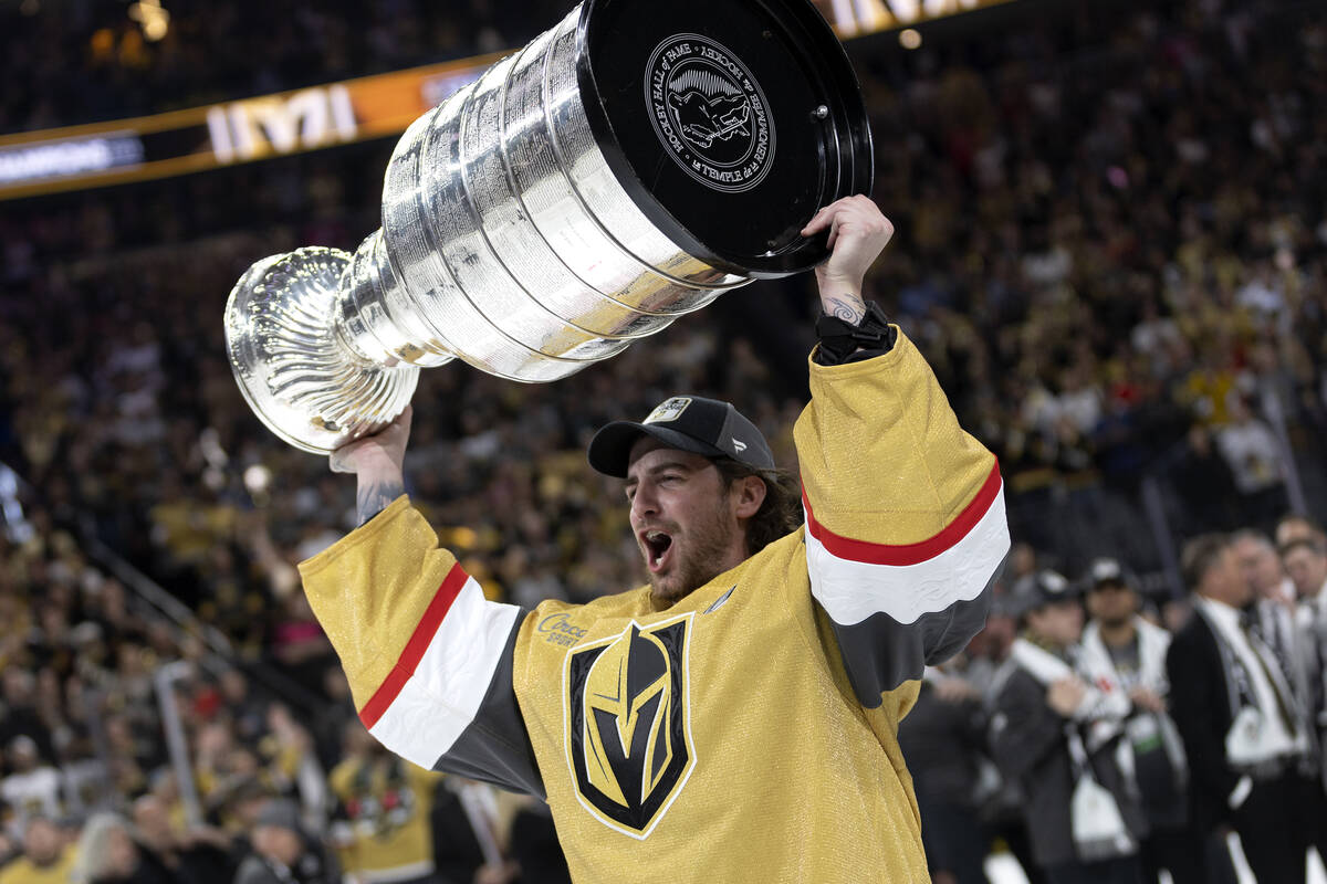 Golden Knights goaltender Logan Thompson (36) celebrates with the Stanley Cup after winning the ...