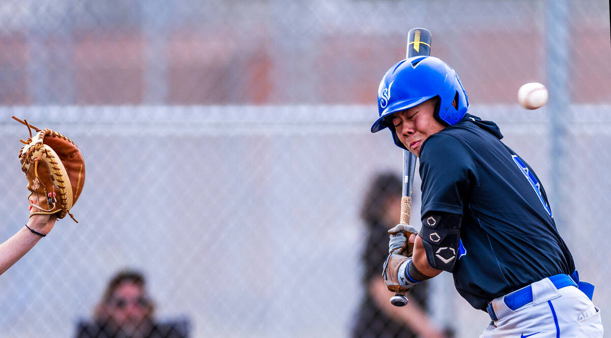 Sierra Vista batter Alex Guevara (8) turns from a high and inside pitch from a Legacy pitcher d ...