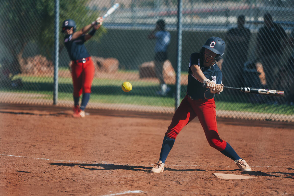 Coronado’s Summer Gilliam (3) pulls her bat back to hit the ball during a softball game ...
