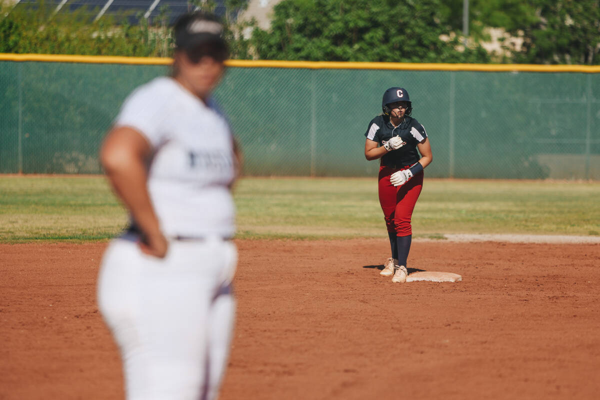 Coronado’s Summer Gilliam (3) signals to a teammate as she gets ready to run to home bas ...