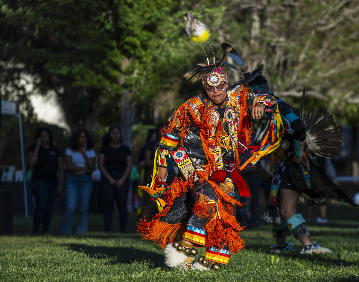 Navajo dancer Sal Brown from Flagstaff competes about the grounds while performing for the crow ...