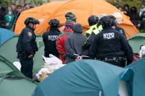 NYPD officers make arrests of Pro-Palestinian protesters on the lawn of Columbia University on ...
