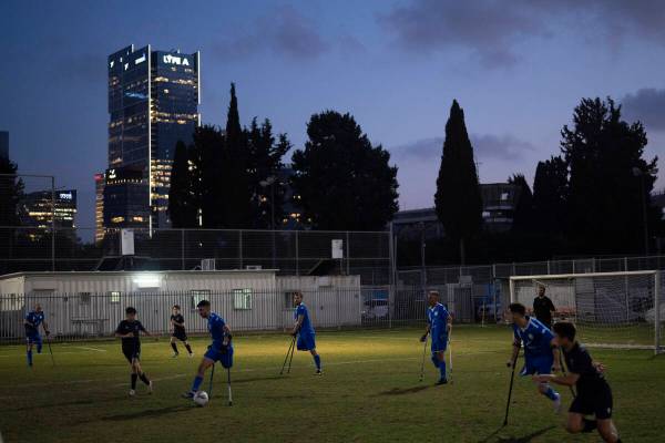 Israel Amputee Football Team soccer players take part in a practice session with young players ...
