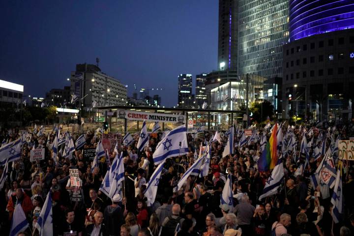 People protest against Israeli Prime Minister Benjamin Netanyahu's government and call for the ...