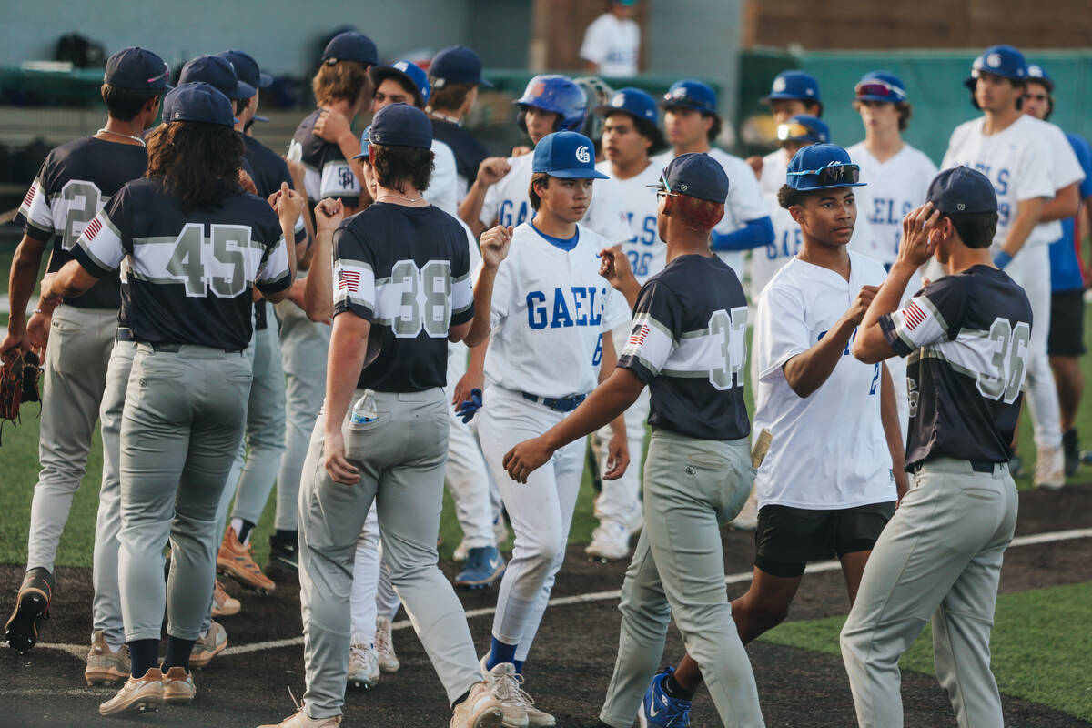 Bishop Gorman players give high fives to Shadow Ridge players after losing 7-0 during an baseba ...