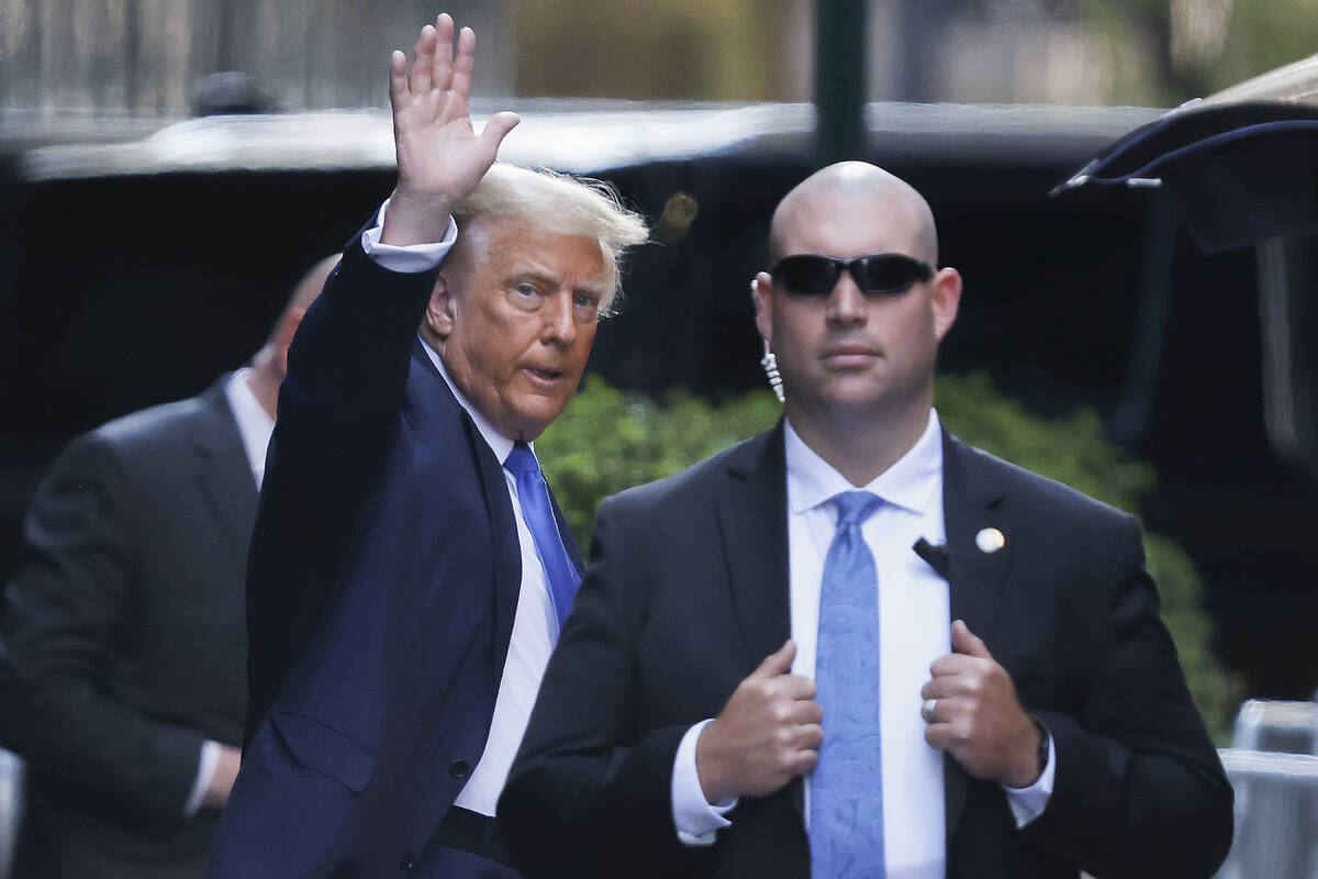 Former president Donald Trump leaves Trump Tower on his way to Manhattan criminal court, Monday ...