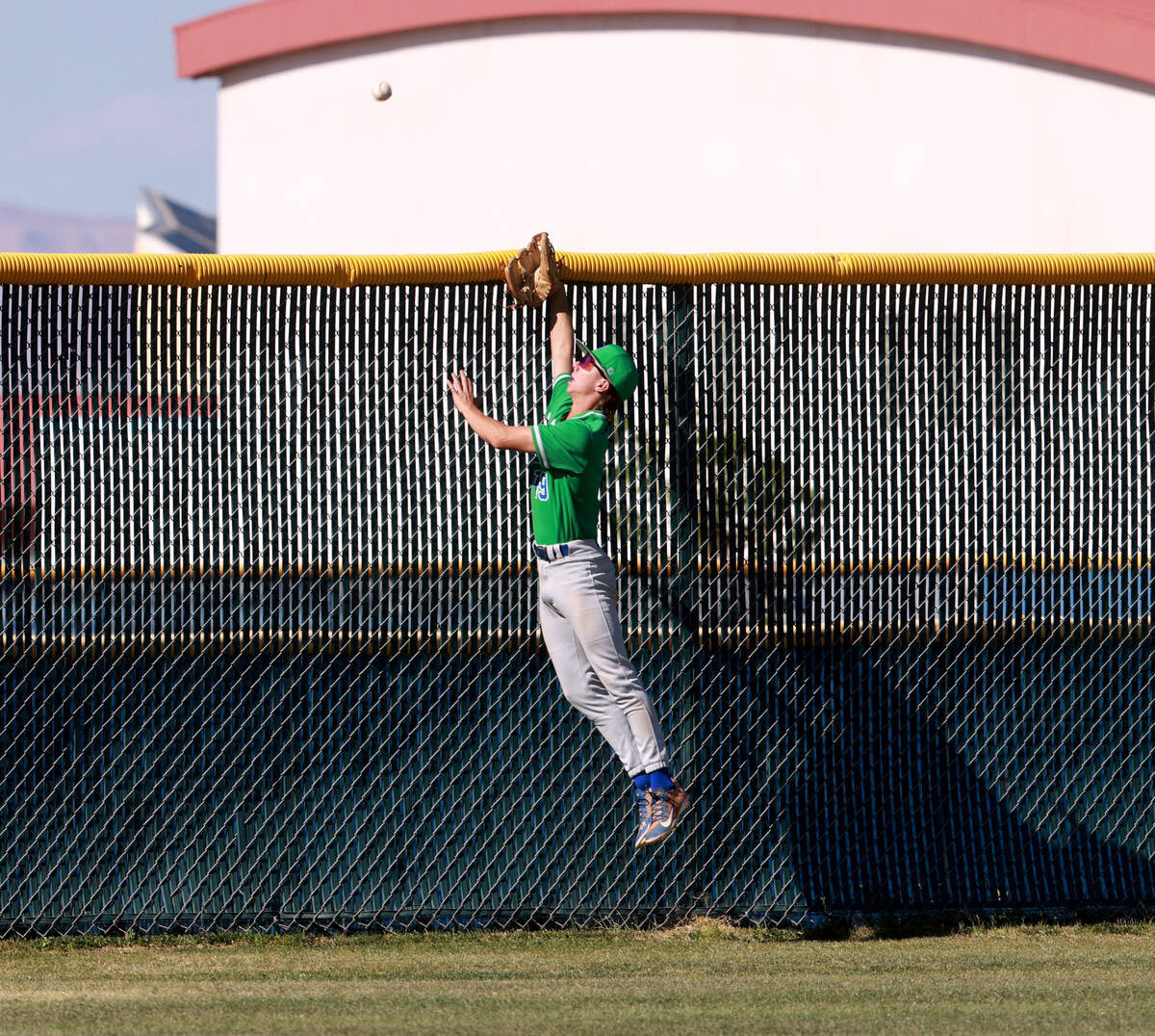 Green Valley outfielder Benjamin Byington (19) can’t reach a home run by Foothill&#x2019 ...