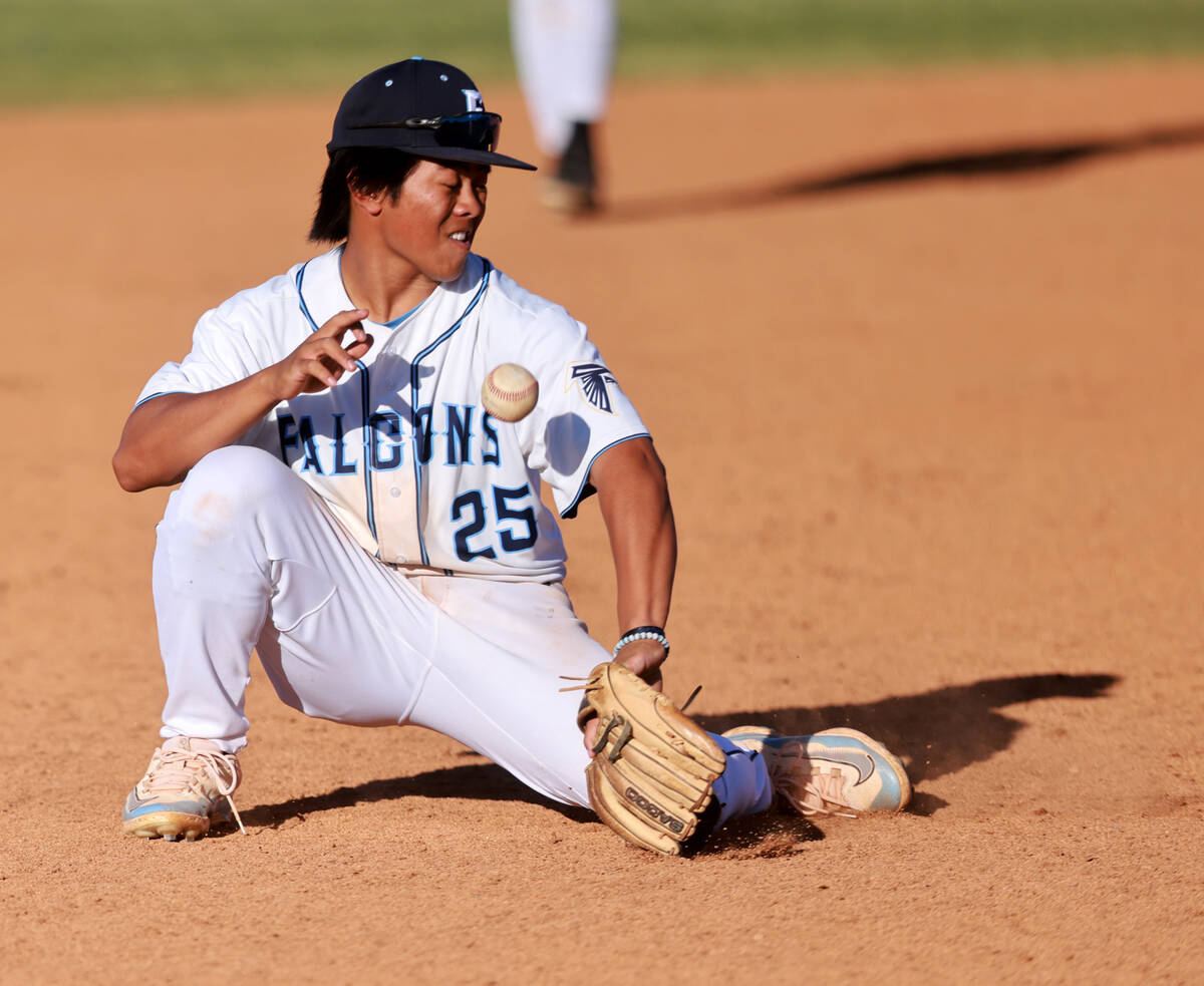 Foothill infielder Zaden Kekoa Sibal (25) can’t bring in a Green Valley ground ball in t ...