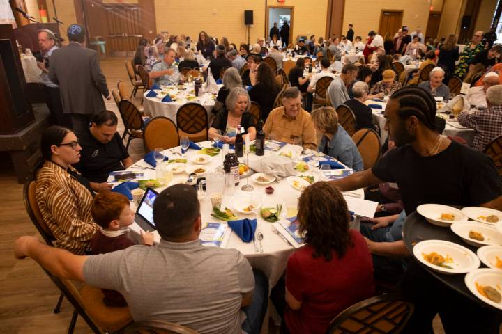 Matzah balls are passed out during a Passover Seder meal at Congregation Ner Tamid on Monday, A ...