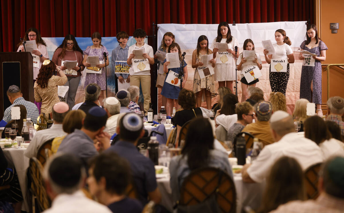 Children perform during a Passover Seder meal at Congregation Ner Tamid on Monday, April 22, 20 ...
